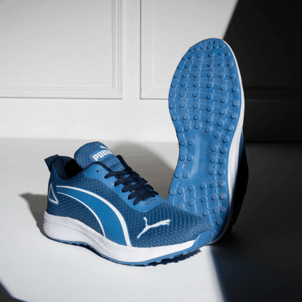 ⁦كوتشي PUMA EVA K15 – خفة وعصرية في كل خطوة⁩ - الصورة ⁦4⁩