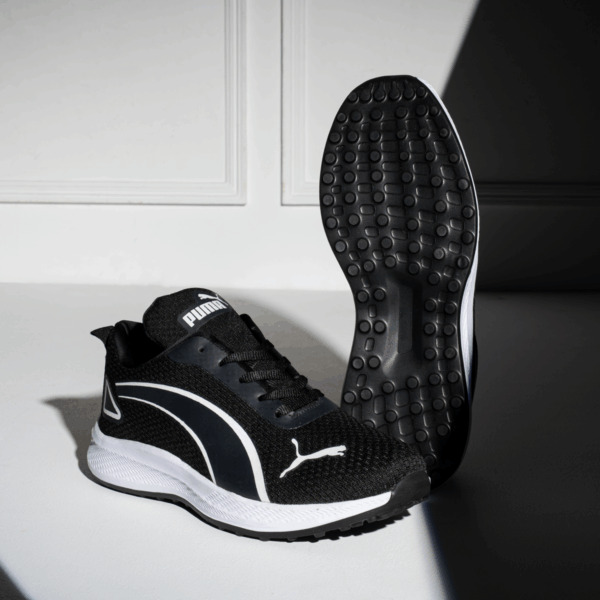 ⁦كوتشي PUMA EVA K15 – خفة وعصرية في كل خطوة⁩ - الصورة ⁦3⁩