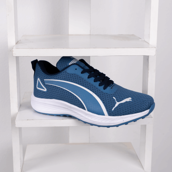 ⁦كوتشي PUMA EVA K15 – خفة وعصرية في كل خطوة⁩ - الصورة ⁦7⁩