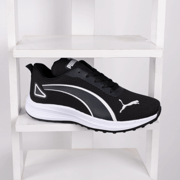 ⁦كوتشي PUMA EVA K15 – خفة وعصرية في كل خطوة⁩ - الصورة ⁦6⁩