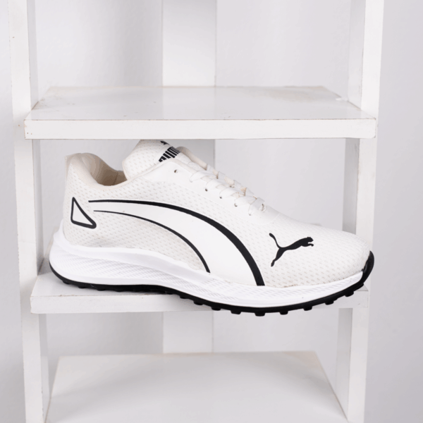 ⁦كوتشي PUMA EVA K15 – خفة وعصرية في كل خطوة⁩ - الصورة ⁦5⁩